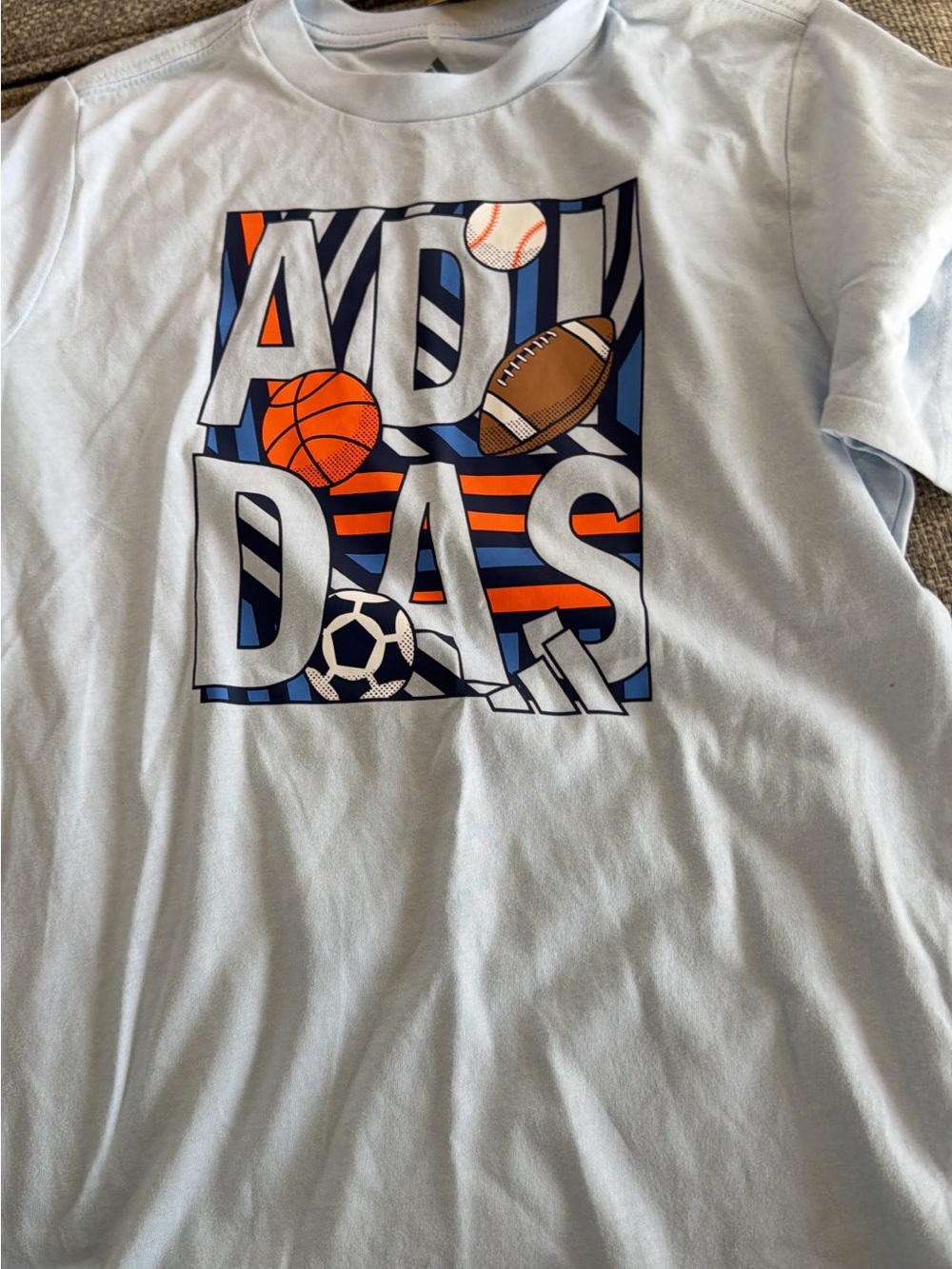 Shirt with sports balls